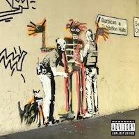 a man and a dog are standing next to a graffitied wall